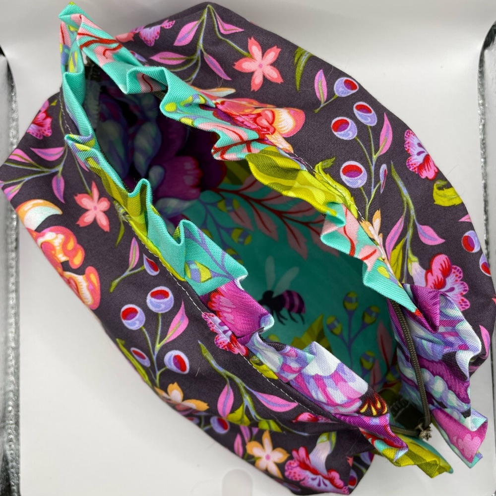 Handmade ruffled zipper bag made from Tula Pink fabric